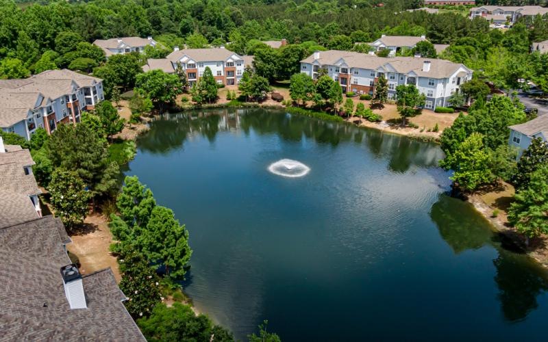 a body of water with houses around it