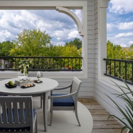 a table with chairs on a large patio